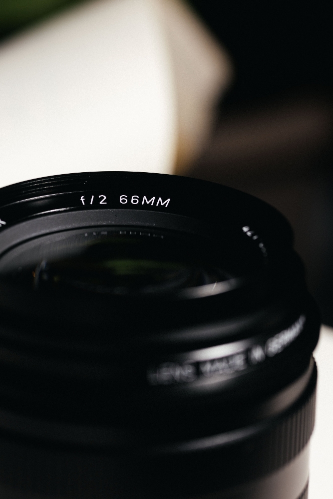 Close-up of the Leica Summicron-M 66mm f/2 front ring engraved f/2 66MM and LEITZ MADE IN GERMANY